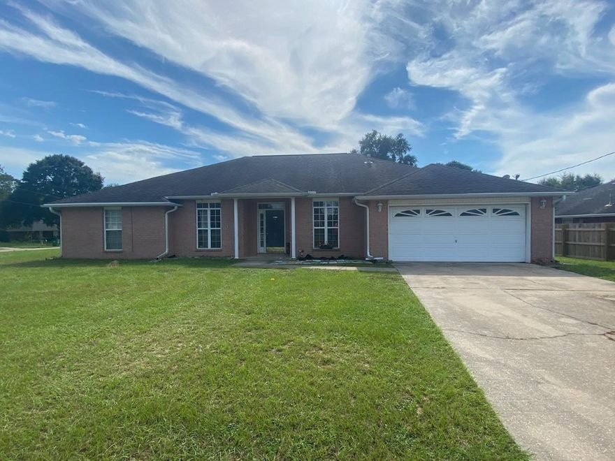 Come check out this HUGE home in South Crestview for only $195K! Perfect home for someone looking for a fixer upper or a great flip. This home features 4 bedrooms, 2 bathrooms, a large living room, dine in kitchen area, office/ bonus room AND a formal dining room. It sits on a great corner lot that is close to the neighborhood entrance. Schedule your showing today before this one goes!