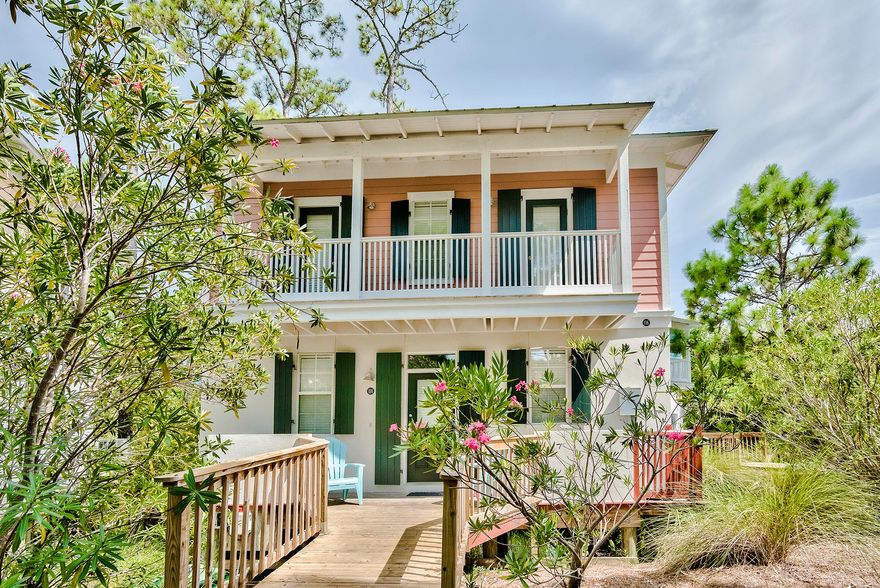 Opportunities don't come along often to own an adorable cottage in the family-friendly Bungalows at Seagrove! The Bungalows is nestled just north of Hwy 30A- just a couple of blocks north of the beach access and is within biking/walking distance to Seaside and Watercolor. This bungalow is positioned on the lakefront, close to the pool, but yet tucked away in a secluded, quiet part of the community.  The first floor features an open floorplan with a combination kitchen/dining area and living room. Also on the first floor is a half bath and laundry room with a new stackable washer and dryer. Upstairs is the master bedroom suite, a guest bedroom suite, and a balcony open to both suites. Community amenities include two pools, one heated pool and hot tub, pool house with bathroom facilities, plenty of parking and well kept grounds. Dimensions to be verified by the buyer.