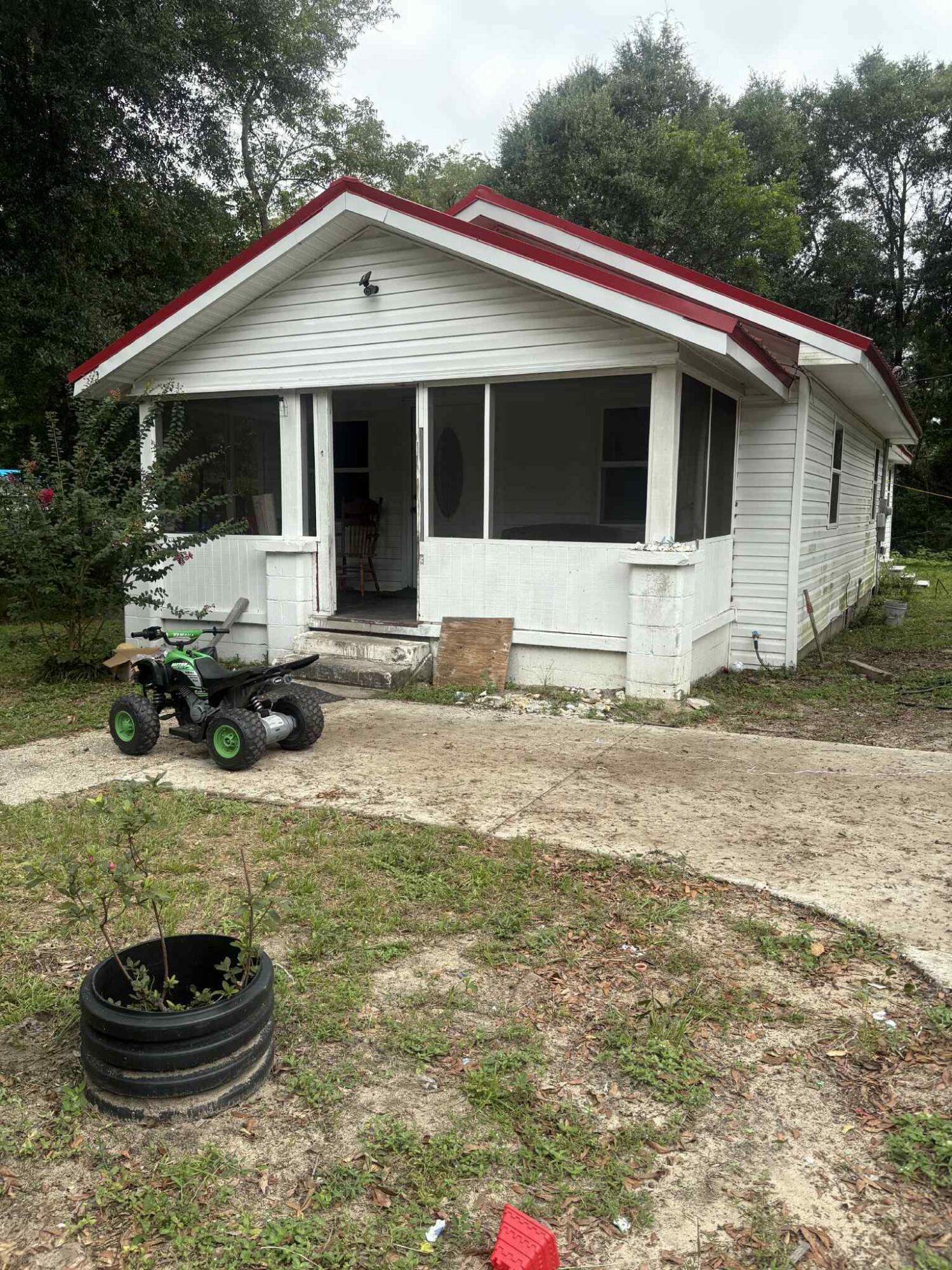 This property showcases a picturesque setting mere moments away from serene Lake DeFuniak and vibrant downtown. Perfect for first-time buyers or expanding families, this residence is strategically situated for those seeking a balanced lifestyle.