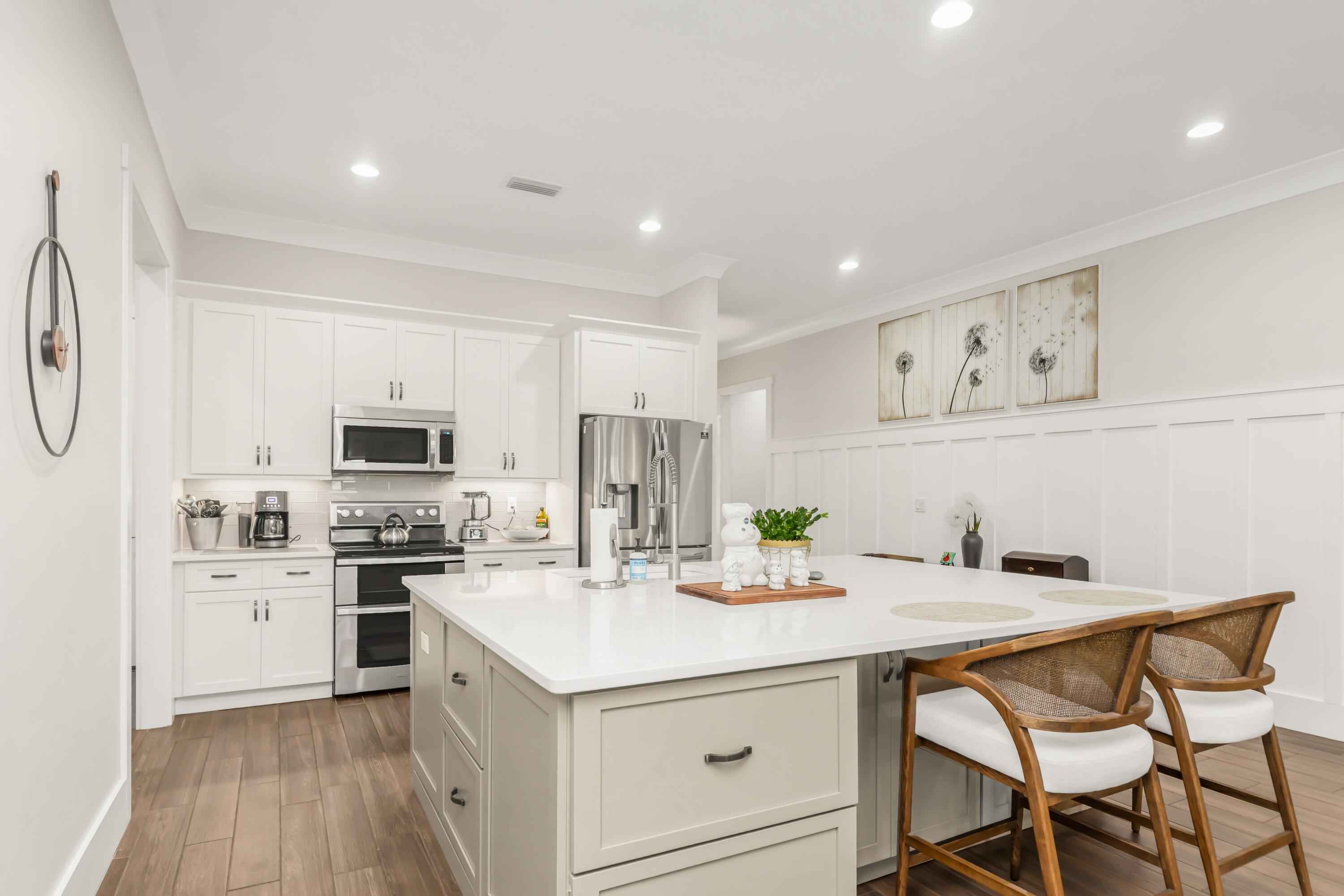 Quality Custom Build by John Cunningham, 30A Builder**Lakefront**18.7 miles to 30A Beaches**Amenities Galore (see below)**Two Marinas Within 4 Miles**4BR/3BA**2,666 SF**Thoughtful Design, Open, Airy, Inviting**10' Ceilings Throughout**Eight foot doors**Tray Ceiling Living/Primary**Board and Batten**101'x76' Kitchen Island**Quartz Countertop**Ample Cabinetry**Modern Hardware**Pot-Filler Faucet**Walk-In Pantry**Custom Wood Shelving**Stunning Great Room**Sleek Modern Fireplace**Spacious Screened Porch**Outdoor Dining/Lounging Zones**New Paver Patio**Fully Fenced**Fresh Landscaping**Serene Primary Retreat**Wood Wall Accent**Primary Custom Closet To Die For**Walk-in Tiled Shower**Dual Shower Heads**Fresh Paint Living/Primary**Luxury, Location, Function**3,000 Acre Neighborhood**(see More) Main Clubhouse**Bayfront Clubhouse**Creek Side Clubhouse**Four Swimming Pools**Amphitheater**Brewery**General Store**8,000 SF Fitness Facility**Tennis**Pickleball**Basketball**60 Acre Sports Complex**Walking Trails**Two Dog Parks**Event Coordinator**Farmers' Markets**Concerts**Holiday Celebrations**Seven Boat Launches Within 10 Miles**82 Amadeus Awaits You! Buyer to verify all dimensions and information important to them.