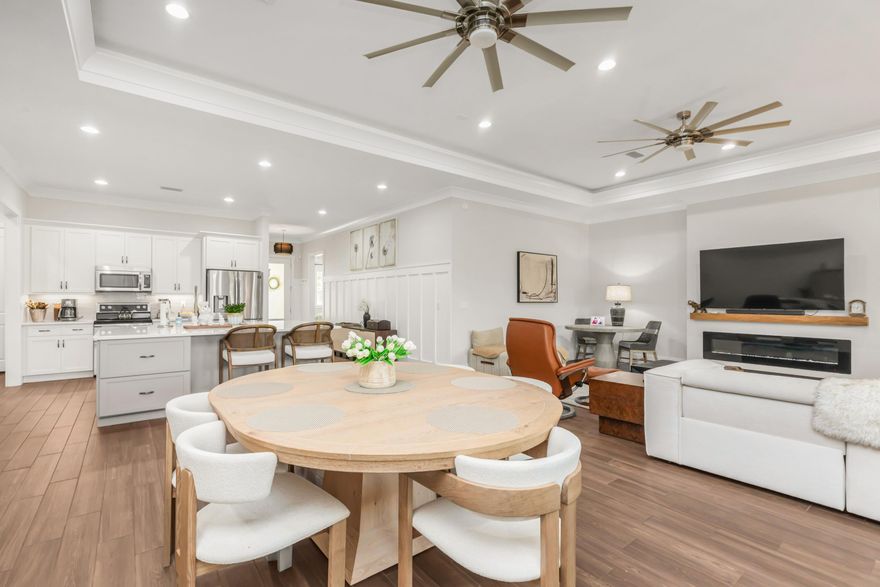 Comfort, Style & Convenience Priced to Sell and Move-in Ready! Welcome to 82 Amadeus Ave, a thoughtfully designed, custom-built John Cunningham home that seamlessly blends everyday functionality with high-quality features and upgrades. This residence offers peaceful living with quick access to the emerald waters, sugar-white sandy beaches, and the year-round happenings of the scenic 30A and Destin communities, as well as a neighborhood packed with resort-style amenities. The exterior is Craftsman style with a modern twist. Step inside to airy, light-filled rooms with 10-foot ceilings and a free-flowing layout perfect for gathering or relaxing. The heart of the home is the newly updated kitchen, featuring an impressive island with a quartz countertop, abundant cabinetry with  (see more) modern hardware, and a walk-in pantry with custom wood Modern shelving. The open great room, featuring a recessed ceiling, seamlessly connects to a screened porch that spans the length of the indoor living space, providing room for both outdoor dining or lounging. Outside, fresh landscaping, a new paver patio, and a fully fenced yard overlooking a lovely, stocked pond create a private space for relaxing or entertaining family and friends. The primary suite is a comfortable yet luxurious retreat, featuring a wood-accent wall, a dream-worthy custom closet, and a spa-like bath with a walk-in tiled shower and dual shower heads. Three additional, generously sized bedrooms offer flexibility for family, guests, a home office, or hobbies. Appliances include a refrigerator/freezer and washer/dryer.  Home also comes with a transferable termite bond.
Life in Hammock Bay means more than just a beautiful home. Enjoy a 3,000-acre master-planned community with multiple clubhouses, four pools, tennis and pickleball courts, a fitness facility, a brewery, a general store, a sports complex, dog parks, walking trails, and year-round events from farmers' markets to concerts, all within walking distance of your home in the Symphony subdivision. 
Here, you can have it allopen floor plan, quality finishes, a private setting, and an active coastal lifestyleall for under $600,000. 
82 Amadeus is ready to welcome you home. 
