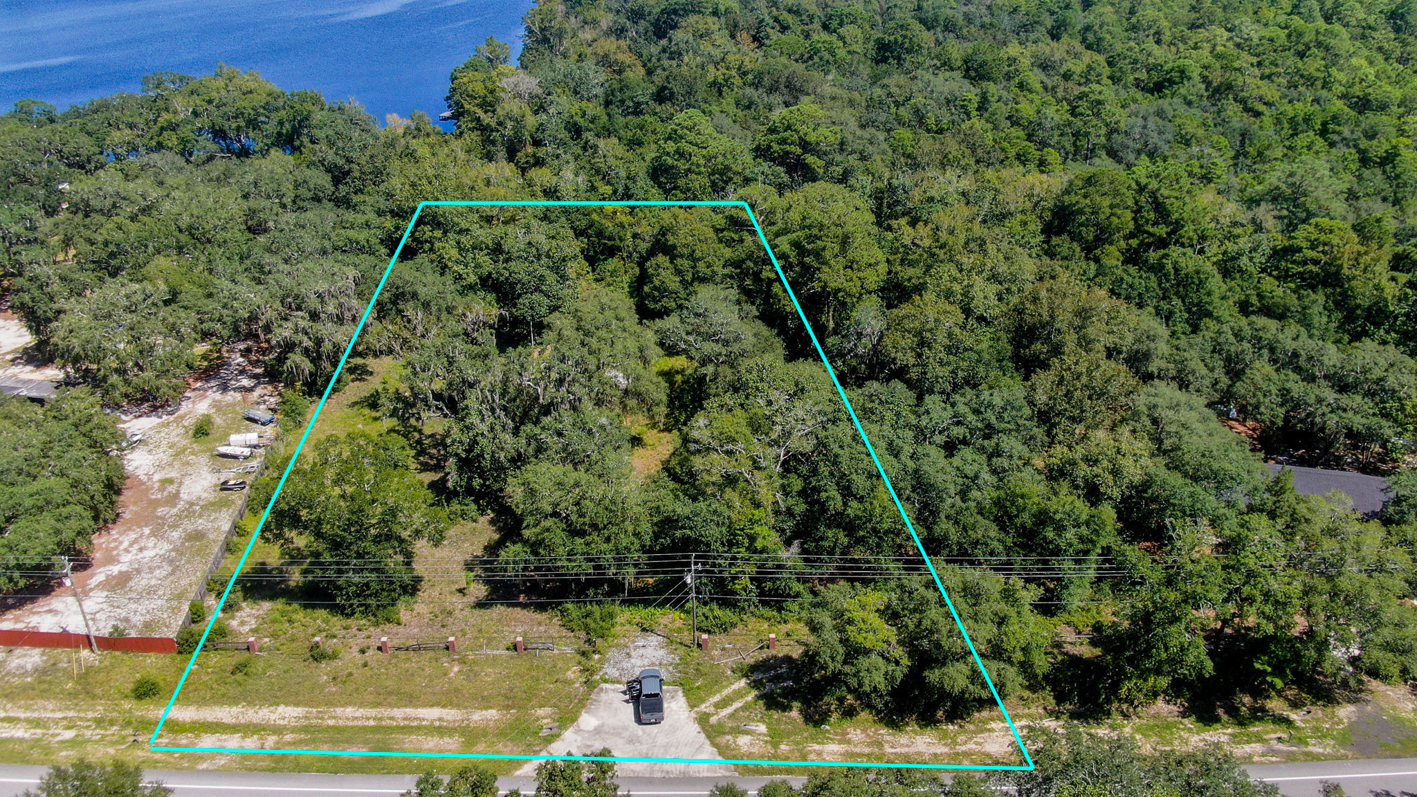 Price reduced! Amazing location, close to everything! Beautiful small acreage (just under 4 acres) UNRESTRICTED and NO HOA! Bring the family and build your home(s) here! Current zoning on this parcel is Rural Residential, up to two units per acre per Walton County Zoning. Located on Hwy 20 in Basin Bayou, this property is only 15 minutes from Destin and 20 minutes to the airport and military base. This parcel is one-of-a-kind. Utilities run across the front of the parcel. Don't miss out on this one, call for your tour today! Bring Offers!