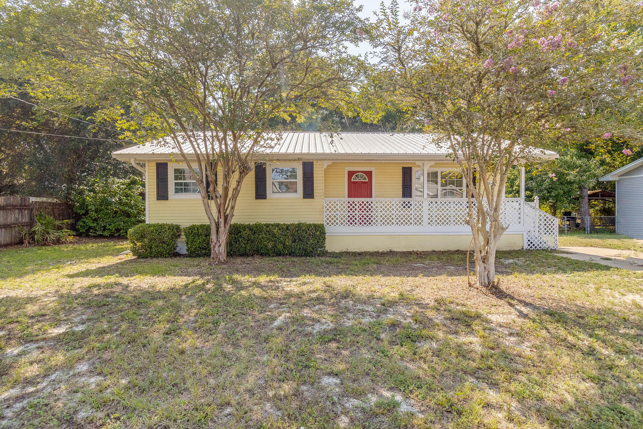 Come and see this well-maintained Florida Cottage. Home has 2 spacious bedrooms, 2 full bathrooms and a large living space. Conveniently located to Navarre, Hurlburt Field and Fort Walton Beach. This home also features a covered front patio and a covered back porch. The fully fenced in back yard is perfect for spending evenings winding down. Come see this home for yourself!