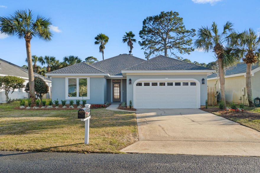 Freshly renovated and move-in ready, this beautifully updated 4-bedroom home plus heated and cooled Florida room offers a seamless blend of comfort, functionality, and coastal lifestyle. Tile flooring flows throughout the home, complemented by updated lighting fixtures and a freshly painted exterior for a crisp, modern feel.The renovated kitchen features freshly painted cabinetry with new hardware, granite countertops, an undermount sink, and brand-new stainless appliances--creating a clean, elevated space ideal for everyday living and entertaining. Both bathrooms have been tastefully updated with new tile tub/shower combinations and new vanities. The spacious primary suite is filled with natural light and includes a generous walk-in closet and private renovated ensuite bath. The heated and cooled Florida room features a durable epoxy-coated floor and offers flexible space for a home office, fitness area, playroom, game room, or additional living area. A wood-burning fireplace adds warmth and character, while the two-car garage provides attic storage and an additional refrigerator.

Exterior upgrades include a new privacy fence with gate, refreshed landscaping, and a new mailbox. Major systems include Roof (2022), Water Heater (2017), and HVAC (2015). Additional peace of mind comes with a recent termite inspection, wind mitigation report, 4-point inspection, and impact-rated vinyl windows--one of the few homes in the community offering this upgrade.

Residents enjoy community amenities including a bayfront dock, pool, tennis courts, park, and pavilion, along with nearby county park access featuring a public boat launch, pickleball courts, and playground. Located just minutes from the bay and a short drive to the beach, this thoughtfully sized home offers an easy, low-maintenance coastal lifestyle.