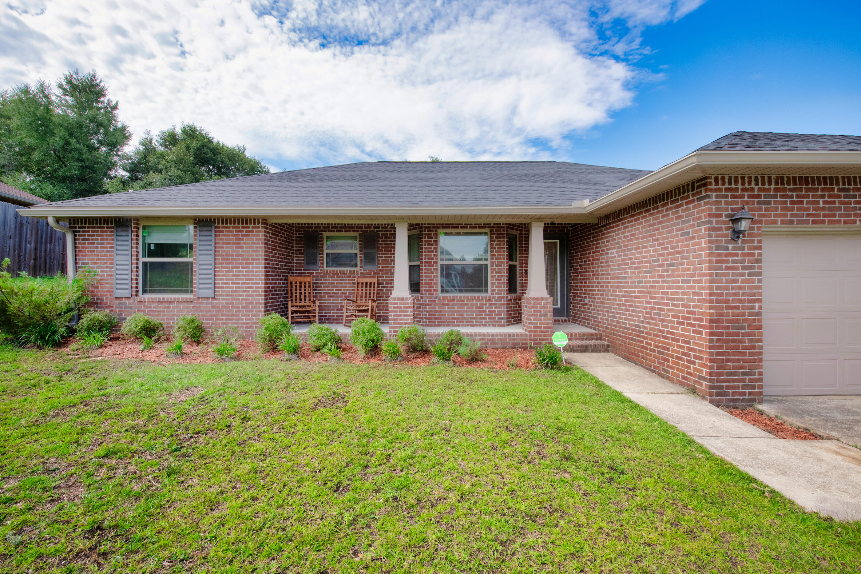 Sellers willing to help with closing costs!!2017 Like new all brick home on over a quarter of acre of land. No HOA but surrounded by similar well-kept homes. Oversized split floor plan 3-bedroom 2-bathroom southern comfort 2 car garage abode. Tray ceilings in the primary en-suite. Totally new fenced in backyard, all laminate vinyl flooring throughout this lovely home! New Bosch dishwasher and like new stainless-steel appliances. Ceiling fans are conveniently located throughout along with recessed lights. There is a charming sized wooden deck outback for a clear view of a beautiful country sunset. Five minutes from downtown Crestview and other local shopping.14 minutes from I-10 and 30-40 minutes from Eglin AFB and 20 minutes from Duke Field. This home was well taken care of!