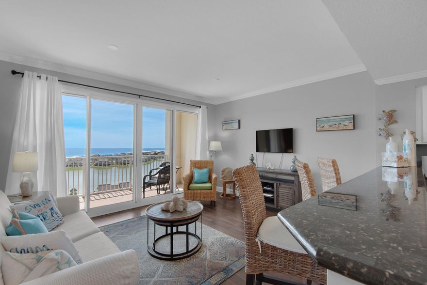 Unbeatable location and amenities, panoramic views, freshly-painted and stylishly decorated: this is the perfect condo for a beach home or an investment property! Light, airy and comfortable, with an open floor plan and all the conveniences of home. As part of the Seascape Resort community you and your guests will enjoy 2,000 feet of beach frontage, 18-hole golf course, tennis courts, a conference center, private fitness facility, pools, shopping, nearby entertainment venues and much more! This condo is conveniently located across from the elevator.
Buyer(s) to verify all dimensions. Fish artwork on the bedroom does not convey. 
Seascape master association dues are $620.27 quarterly and Ariel Dunes association dues are $277.37 monthly. There is a onetime buyer fee of $620.27 (one quarter).