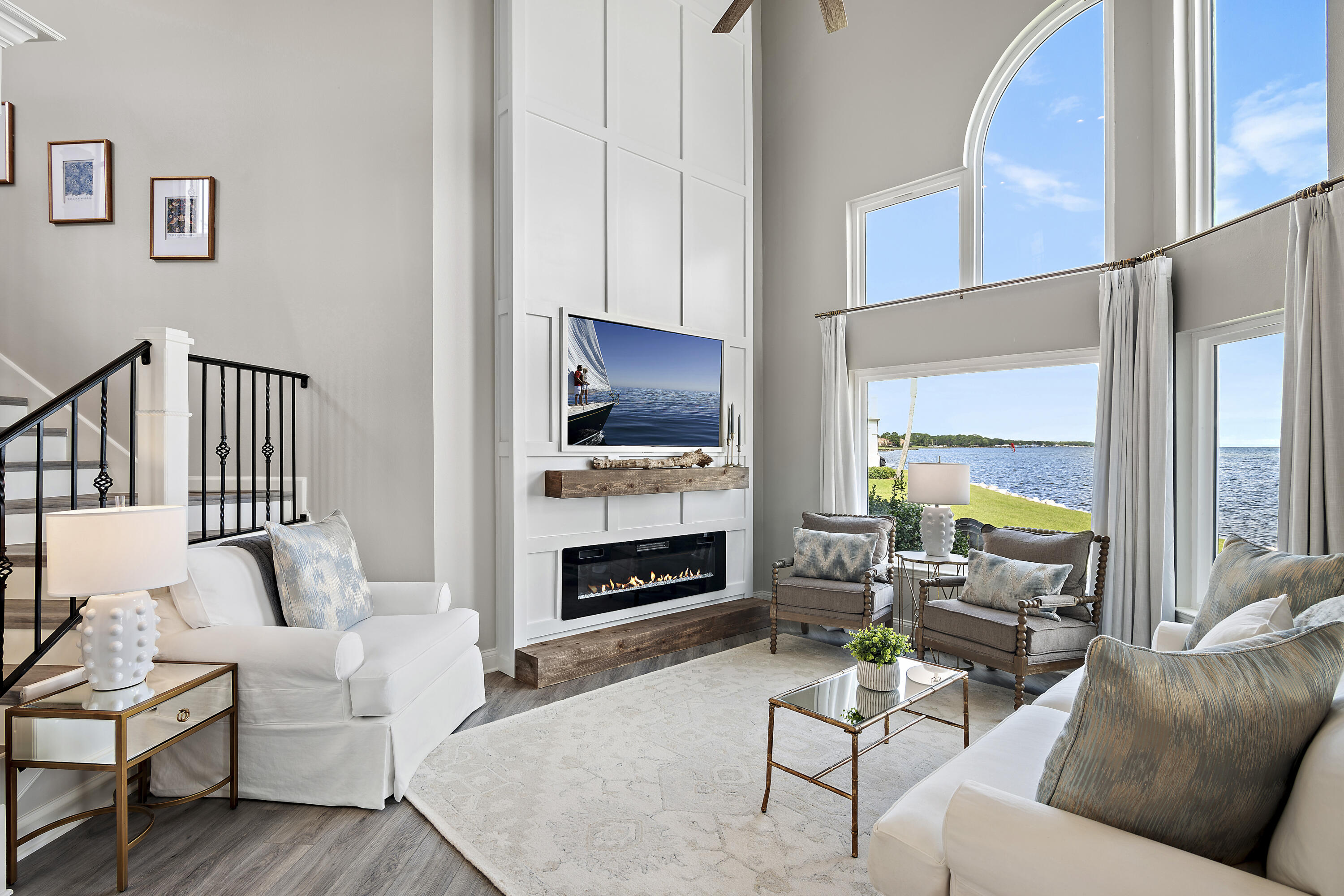 Located in the exclusive Northshore community within Sandestin Golf & Beach Resort, this beautifully updated three-bedroom, three-bathroom townhome offers an exceptional opportunity for bayfront living. Positioned along the tranquil waters of Choctawhatchee Bay, this home captures the essence of coastal luxury with breathtaking water views, recent renovations, and access to world-class resort amenities. Whether used as a permanent residence, second home or investment property, this townhome delivers the perfect combination of privacy, modern comfort and resort-style living. The open-concept living area is filled with natural light, drawing your attention to the stunning bay views just beyond the screened patio. This space is perfect for relaxing mornings with a cup of coffee or enjoying a peaceful evening while listening to the gentle waves against the seawall. The thoughtfully designed kitchen features a farm sink, gold hardware, stainless steel appliances and a stylish backsplash. The spacious dining and living areas make entertaining effortless, complete with an electric fireplace that offers customizable lighting for ambiance.
With two primary suites, one on each level, this home provides plenty of space for family and guests. The first-floor primary suite has private patio access and a spa-like ensuite with a tub/shower combination. Upstairs, the second primary suite offers a walk-in closet, dual vanity and a walk-in shower, along with a private deck where you can soak in the bay views. A third guest bedroom with a king-sized bed and ensuite bath completes this well-appointed layout.
This townhome is located in an intimate community of just 25 residences, offering a quiet retreat with fresh exterior updates including new paint, metal roofs, enhanced landscaping and a new seawall. The included golf cart allows for effortless exploration of Sandestin, a true golf-cart-friendly resort with miles of scenic paths that wind through lush greenery, coastal lakes and charming village areas.
As part of Sandestin Golf & Beach Resort, owners can access an unparalleled lifestyle with four championship golf courses, a 226-slip marina, 15 world-class tennis courts, pickleball courts, a fitness center and miles of sugar-white beaches. The Village of Baytowne Wharf is just a short golf cart ride away, featuring boutique shopping, fine dining, entertainment and year-round events.
With stylish coastal d??cor, high-end finishes and turn-key readiness, this bayfront townhome presents an incredible opportunity to own a piece of paradise in one of the Emerald Coast's most desirable communities. Whether you're looking for a relaxing retreat or an investment property, this home is ready to deliver the best of Sandestin living.