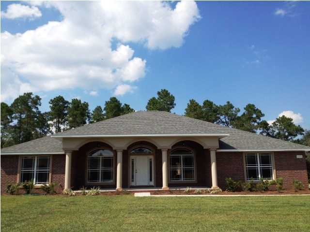 **FALL SPECIAL ! Builder is offering $5,000 in free upgrades on this home ! Your choice of upgrades ! Limited time, so hurry ! **NEW CONSTRUCTION - READY NOW ! Great location in beautiful new neighborhood, close to Eglin AFB, Duke Field, and 7th Special Forces Group. Only 3 miles from Crestview ! NEWLY DESIGNED PLAN! Don't miss this quality-built home by an exceptional Semi-Custom homebuilder in new neighborhood of Mossy Oak. This award-winning builder has an all-new plan loaded with amenities, including: * All brick exterior with stucco accents and columns * 30-year dimensional shingles * 5/8'' Sheetrock in all ceilings * Energy Efficient Heat Pump * 3-car Side Entry Garage with Steel Garage Door and Garage Door Opener * 4 Bedrooms / 3 Full Baths * Split Bedroom Design * 24x14'