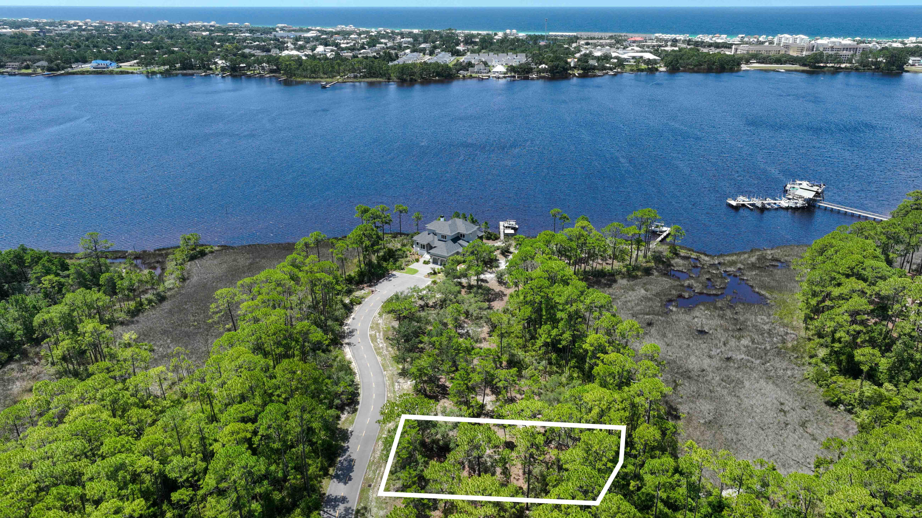 Discover the opportunity to build your dream home in the exclusive Wild Heron community. Just steps from Lake Powell, this homesite perfectly captures the essence of true Florida living. Surrounded by beautiful views of ancient oaks, shimmering dune lake, and lush nature, it offers a serene setting for your future. Don't miss your chance to be part of this prestigious community.