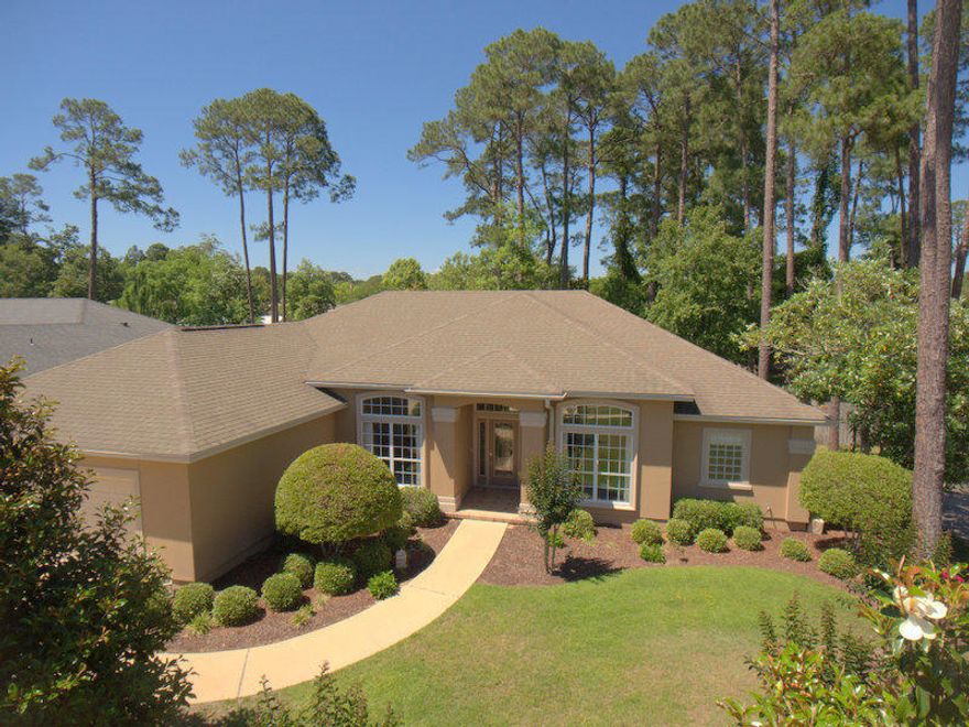 Immaculate one owner, custom built home on a large level lot. Centrally located, in a very peaceful and upscale S/D, this one level home is only minutes to public boat ramp, unique dining, shopping and the bases and beaches of the Emerald Coast. 3 Bedrooms plus an office (4th Room) built in a split floor plan with an open great room, high ceilings, recessed lighting, gas fireplace, interior columns, surround sound speakers, crown moldings, Rounded sheet rock corners and 3 full bathrooms. The kitchen is tiled floors and back splash, granite counter tops, stainless steel appliances, Maple cabinetry and a pantry. The master bedroom has His/Her walk-in closets, French doors to the back patio, whirlpool tub and over sized walk-in shower. Outside you will find a Brand new Trane HVAC system,