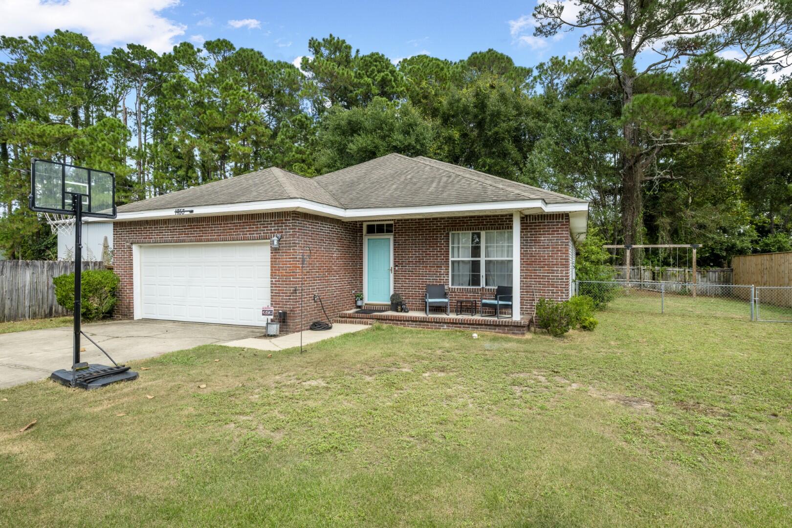 FHA assumable at 3.5% for qualified buyers.Nestled in the heart of Niceville. This charming 3 bedroom, 2 bath ranch-style home offers 1,469 SqFt of comfortable, single level living. Built in 2006, it features a fenced backyard with a covered back porch and uncovered deck, providing versatile outdoor living space. Inside, vaulted ceilings and a breakfast nook add architectural charm and everyday practicality. The spacious primary suite boasts a large bath and double vanities for added convenience. 2022 HVAC ensures year round comfort. New roof offered at closing. Schedule your showing today before it's gone! Buyer to verify all information during due diligence.