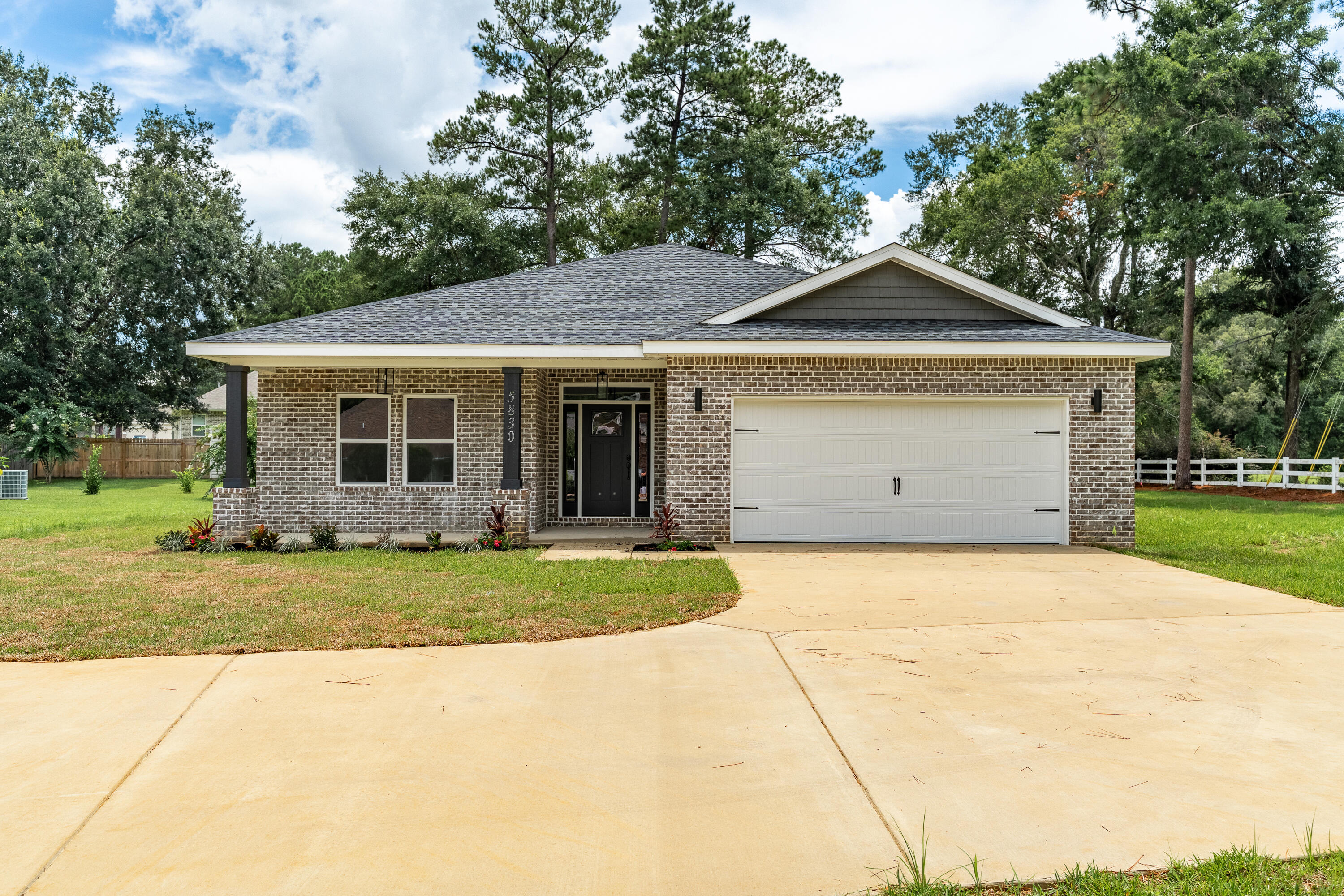 Up to $10,000 ANYWAY MONEY towards closing costs or Interest Rate Buydown. New Construction All Brick 5 Bedroom home. As you enter this open floor plan home, luxury vinyl plank invites you into the foyer & carries throughout. On either side of the foyer are 2 bedrooms & 1 bath. As you continue in the living room opens to your dining area & kitchen with large island. White cabinets & brushed gold hardware provide a classically modern vibe. Quartz counters complete the look. Sliding doors from the living room open to a sitting area off the primary suite. The sitting area is a great office, reading room or nursery. Primary bath has a tiled shower, separate tub, double vanity & walk-in closet. Large fenced yard on cul-de-sac street & plenty of room for a pool