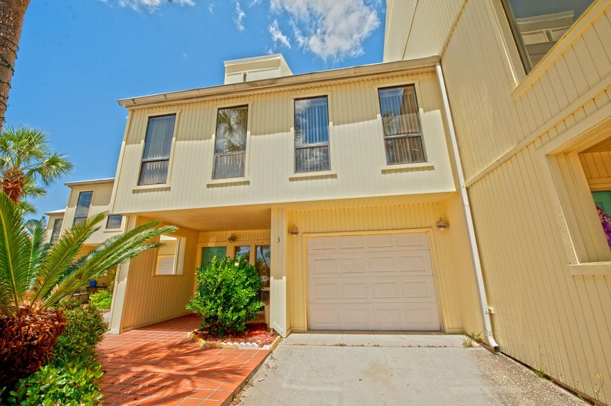 Furnished 4 bedroom townhome rental ready!Walk to the Beach or hop in your boat moored in your own 12 foot wide, deep water boat slip on the intercoastal waterway!View of the water from your large 13x24 deck. Soundside pool and tennis court.The first floor has 1 bedroom. Second floor has 2 bedrooms, living/dining room, galley kitchen and bath. Third floor has master suite with large walk-in closet and 11x19' bonus room ! HOA covers Lawn care, trash disposal, pool maintenance and large dock with electric and water.Enjoy the laid back serenity of Navarre Beach with emerald green waters and white sandy beaches! Just over the bridge there are restaurants, grocery stores, gas stations and shopping!Come live the good life! Now is the time to purchase your 2nd home!!