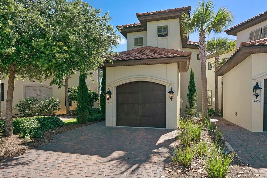 Meticulous Mediterranean style home offered completely furnished in an elegant coastal style. Price includes a 6-seater golf cart. This home is tucked away at the end of Villa Lago and looks out onto the 5th fairway of Baytowne Golf Course and a beautiful lake. Gorgeous white marble flooring throughout the main floor, wood flooring on the second floor, quartz countertops, stainless steel appliances, crown molding, and professional furnishings and decorations are just a few features that make this home picture perfect. In addition, there are two patios to relax on and soak in the amazing views. Enjoy a single car garage and guest bedroom with a full bath on the main floor. This turn-key home would make for a perfect full time residence, 2nd vacation home, or a rental property.