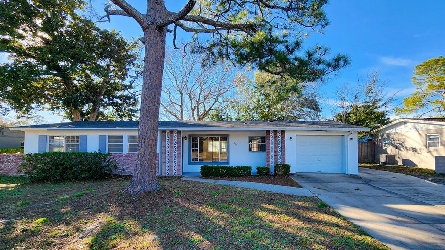BRAND NEW ROOF in 2025. NEW Carpet. Move-in ready 3 BR home less than 3 miles from Hurlburt Field. This single story home has great curb appeal with an extended driveway for RV / boat parking. Upon entering, you'll step into the tiled dining/living space with a new sliding glass door that leads you to a spacious Florida room that has views of the backyard... two of the windows were recently installed as well as new siding! Kitchen is L-shaped with plenty of cabinetry and access to the utility room with additional storage. Fresh paint throughout! On the other end of the home are 3 bedrooms (w/ new carpet), one primary with a private full bathroom with step-in shower. New toilets. Backyard is fenced and spacious!! Home has 1 car garage w/ utility sink and fridge. Gas Water Heater 2021 New AlumiCon connections + GFCI receptacles in home to meet code.