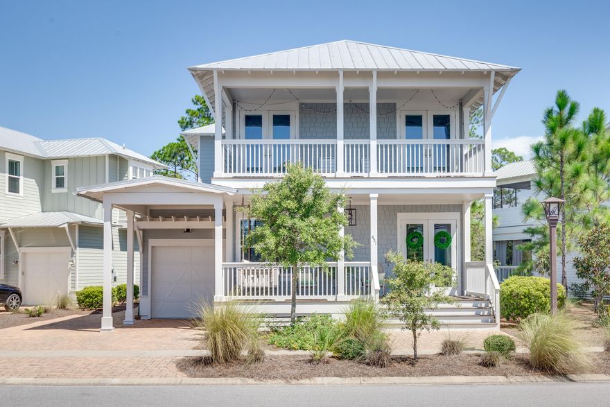 PRICED $125K UNDER THE LOWEST PRICED COTTAGE COLLECTION HOME (HOMES WITH PRIVACY BEHIND)!! Now being sold furnished! This homesite can't be beat! With a 77 foot front, it's the widest in the whole community and DOUBLE the width of the majority of sites in NatureWalk. The benefit = plenty of parking in the driveway, there's room for 4 cars! Also, plenty of room between neighboring homes, giving it a more private, pretty setting. Just sit back on the porch and enjoy the sounds of nature. Popular Wind Chime home with guest bedroom downstairs and wide open family, kitchen & dining. Custom, special touches have been added that you are sure to love- stained pantry door, linear gas fireplace with ship lap accent wall in family room, and stained header at the foyer of the house.