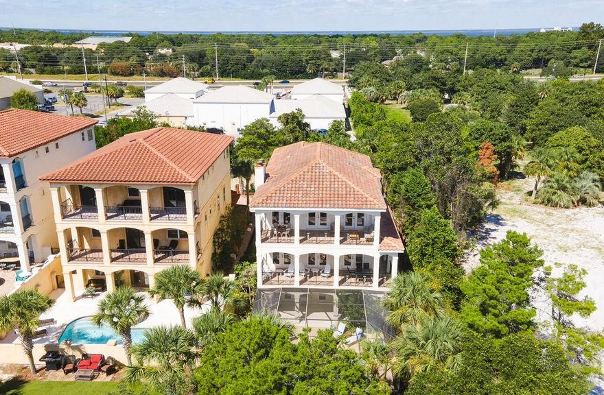 Welcome to your dream home south of 98 with Gulf Views or rental income producing vacation home in Miramar beach! 2023 it produced $179,000 in rental income!!! 2024 projection is 180k with 140k already on the books for 2024!! Loan is assumable at a 30 year note at 3.8%. This three-story oceanside estate along the sparkling coasts of Destin. This stunning 4-bedroom, 4 bathroom was fully remodeled in 2022. The home boasts over 4000 square feet of luxurious living space, perfect for entertaining family and friends.  The home includes a backyard pool and hot tub, multiple balconies, elevator, and an array of interior hangouts and amenities are all wrapped in upscale, airy design. You'll find the primary living area --- complete with tons of windows and a sleek fireplac