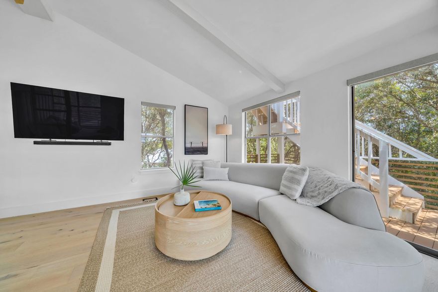 Introducing Treetops 30A--a rare architectural gem offering one of the most unique luxury living and investment opportunities along the Emerald Coast. Situated among a majestic oak canopy on one of the highest natural elevations in coastal Florida, this Bali-inspired retreat captures 180-degree Gulf views and sits just a stones throw from the nearest beach access and the treasured Stallworth Coastal Dune Lake--one of the rarest ecosystems in the world.Crafted to transcend the typical beach home/rental of the area, Treetops 30A blends thoughtful design, organic materials, and curated luxury finishes and decor that rival that of  much higher priced homes in this market.  Add to the experience the serene indoor-outdoor flow, the elevated site and treehouse-like design that evoke the feel of a private Costa Rican villa, enhanced by multiple expansive decks and intimate outdoor "destination" spaces on every level. Here, the peacefulness of the oaks, the Gulf breeze, and the nearby dune lake create a truly unmatched setting.

Originally renovated as a high-performing three-bedroom luxury rental that already ranks among the strongest rental properties in its class, the home has been recently upgraded to a four-bed, four-bath layout and stands to exceed any like rental on the market.  Yet its most compelling advantage lies in its remarkable expansion potential: the existing structure, elevation, and lot configuration allow for a seamless and cost-efficient transformation into a six- or seven-bedroom luxury showpiecea value proposition nearly impossible to replicate on another lot this close to both the Gulf and a Coastal Dune Lake.

With its beachside location, Gulf views, adjacency to Stallworth Lake, and resort-level design, Treetops 30A stands out as a legacy property poised for exceptional enjoyment and long-term financial return. Whether kept as a personal sanctuary or elevated into one of the most iconic Airbnb rentals on the Emerald Coast, this home offers a rare blend of nature, luxury, and future potential that is truly one-of-a-kind.