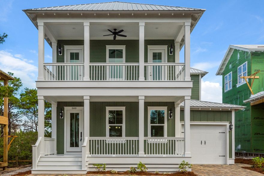 A brand-new beach house in Highland Parks provides a light and open floor plan with tasteful dcor in a muted palette of natural tones. Open and screened porches provide serene views of the nearby wildlife pond and mature trees bordering Point Washington State Forest. Master suites downstairs and up provide ample space for spreading out and finding your own private space. There's even room in the wide upper hallway to create a second living area, TV area or reading nook. Polished wood flooring provides a seamless flow through the impressive open-plan living area. There's space for a formal dining area and a laid-back living/TV area for relaxing and entertaining. The island breakfast bar defines the arctic white kitchen with feature tile backsplash, oversized range and a host of stainless