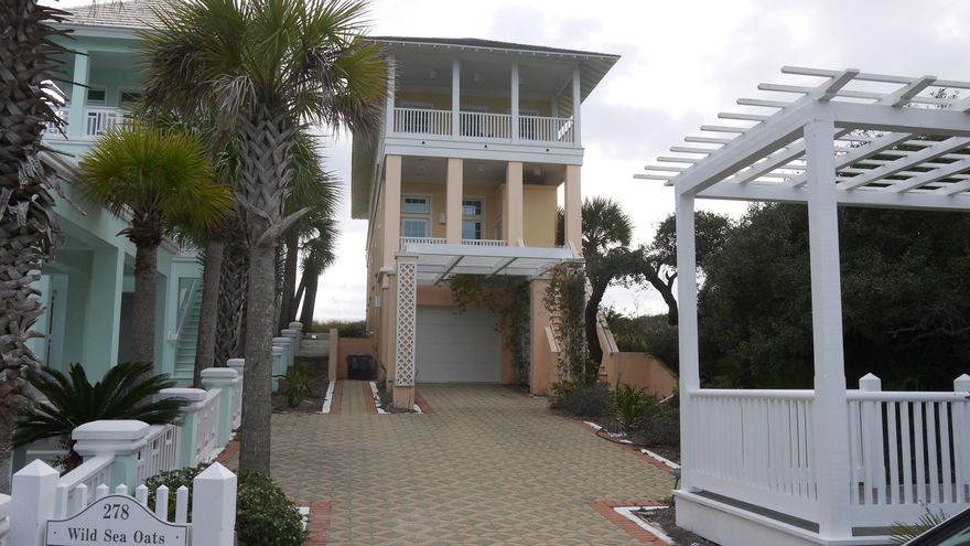 ''Wild Sea Oats'' designed by Architect Gary Justiss. This beach front home to have everything you would want in a classic beach cottage - 1''x6'' tongue in groove wood walls, cathedral ceilings on the top floor, spectacular Gulf of Mexico views from the living/dining/kitchen and master bedroom areas, fireplaces in the living room and master bedroom, double loaded porches on the front and back of the home and so much more. The home has three bedrooms and 3.5 baths along with an elevator, a garage, and wonderful views of Lake Powell and Camp Helen off the north side balconies. The construction is poured-in-place concrete on the lower levels and 1''x6'' frame on the top level of the home.