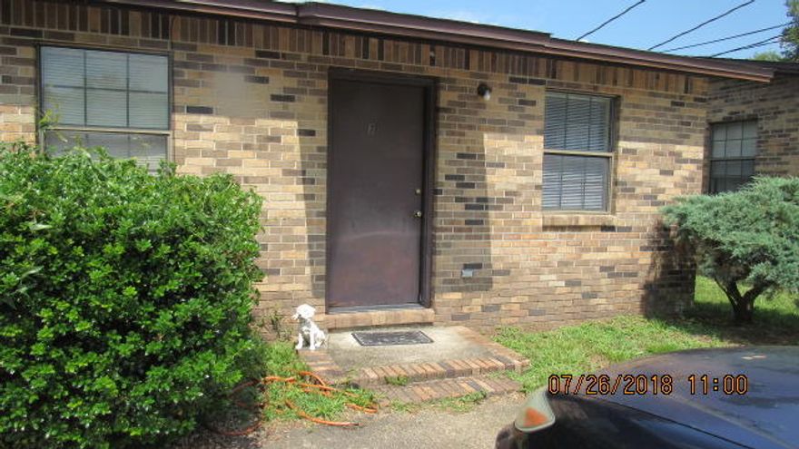 Nice two bedroom apartment with an open floor plan ding, kitchen and living area. Covered back patio. Lawn service included.