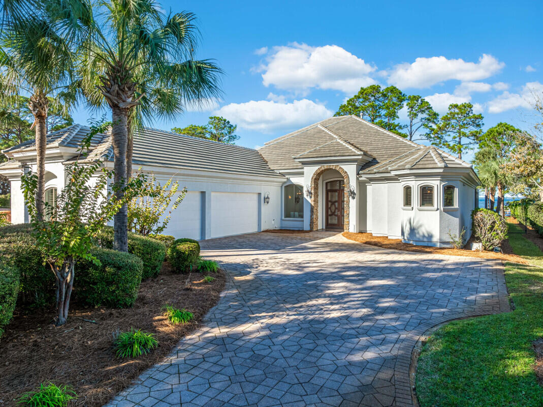 This amazing Bay Front custom-built, Estate home is the best priced bay home currently on the market! 4200 interior Square feet.  97 linear feet of Bay frontage, on a lot that measures approximately 97 x 330. Private, screened L-shaped pool, measuring 38 feet long, 10 feet wide, with an additional 25 ft width for the built-in Spa. Conveniently located in Miramar Beach, close to shopping and dining, yet nestled away in a quiet, friendly neighborhood.Inside, you'll relax with a custom home, 12 foot ceilings on the first level, including 2 living areas, gourmet kitchen with Wolff and Subzero appliances. Formal Kitchen, separate eat-in area. The master suite features a large bayfront bedroom, with large, walk-in closet with built-in cabinetry, and a large custom bath, with separate spa tub, custom shower with 2 wall shower heads, one rainhead, and 2 body sprays. 3 additional bedrooms on the first level and 2 additional full baths. Large Laundry room on the first level as well.
The second level features a large great room, with amazing bay views and balcony. Also on this level is another large bedroom, with private bath.
Need storage space for your cars and belongings, check that box off as well, with the oversized attached 4-car garage.
For the Boater, the Dock is in place and ready for your boat!
Exterior features include Stucco Exterior, and recently installed concrete tile roof. Large paver driveway. Over 7/10s of an acre beautifully landscaped and manicured lot!
Extra bonus, additional spray foam insulation to help lower utility bills!
Easy to show, call today to view the bay front home that you've been waiting for!