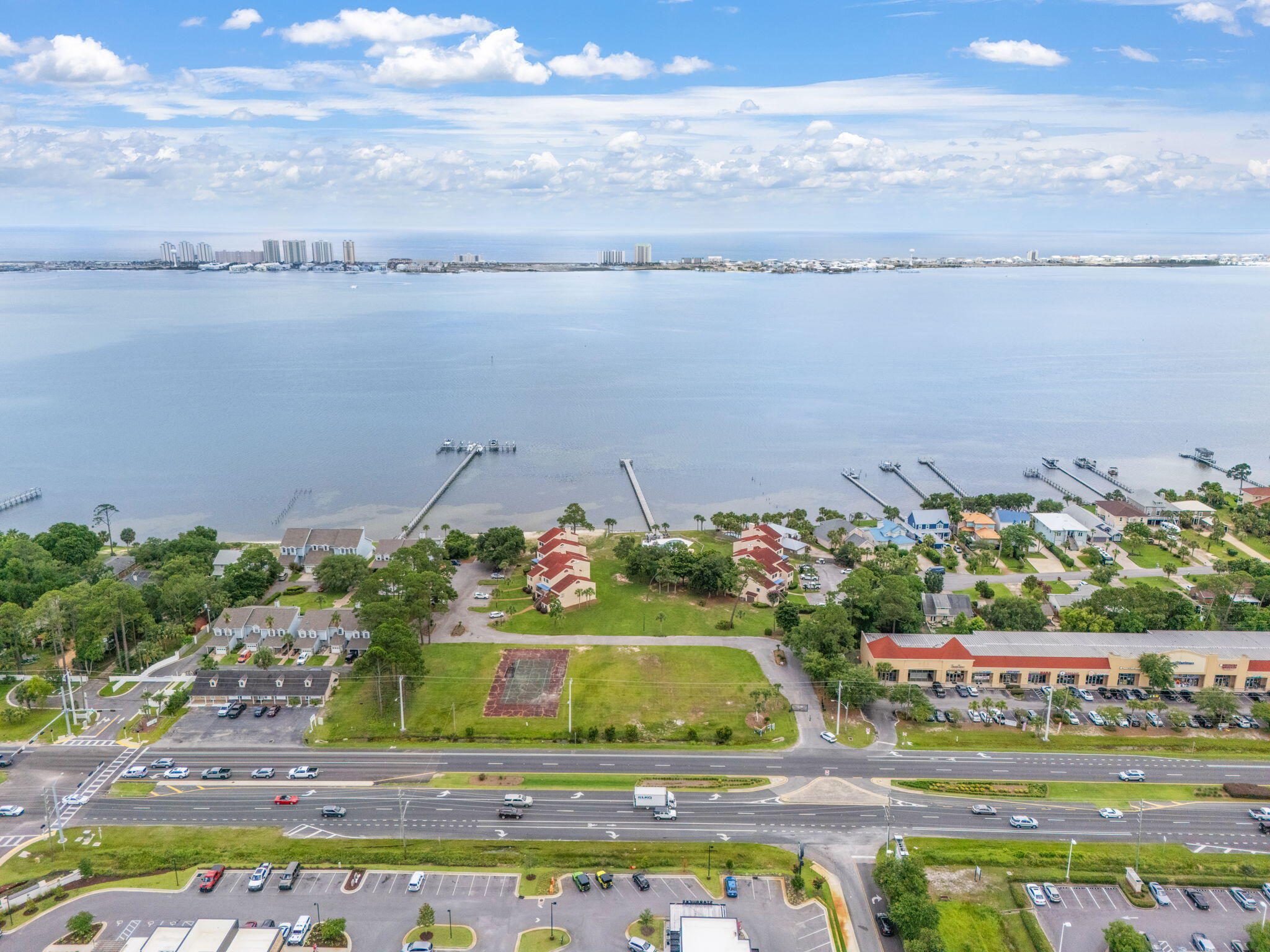 ***NO HOA*** Prime Waterfront Multi-use property in the heart of Navarre, one of Florida's fastest-growing communities! This property offers two parcels spanning 0.8 acres with 180 feet of waterfront along the Santa Rosa Sound. The land features a seawall and fantastic water views, making it the perfect canvas for your vision. With R2 zoning, you have multiple options for development. Developers/Investors: Subdivide the two lots into up to 8 parcels and create your own thriving short-term rental community. Homeowners: Build your dream waterfront home and enjoy breathtaking sunsets. This property offers the perfect blend of beauty, location, and potential. Whether you're looking to invest or create your personal paradise, make sure you check this rare property out.