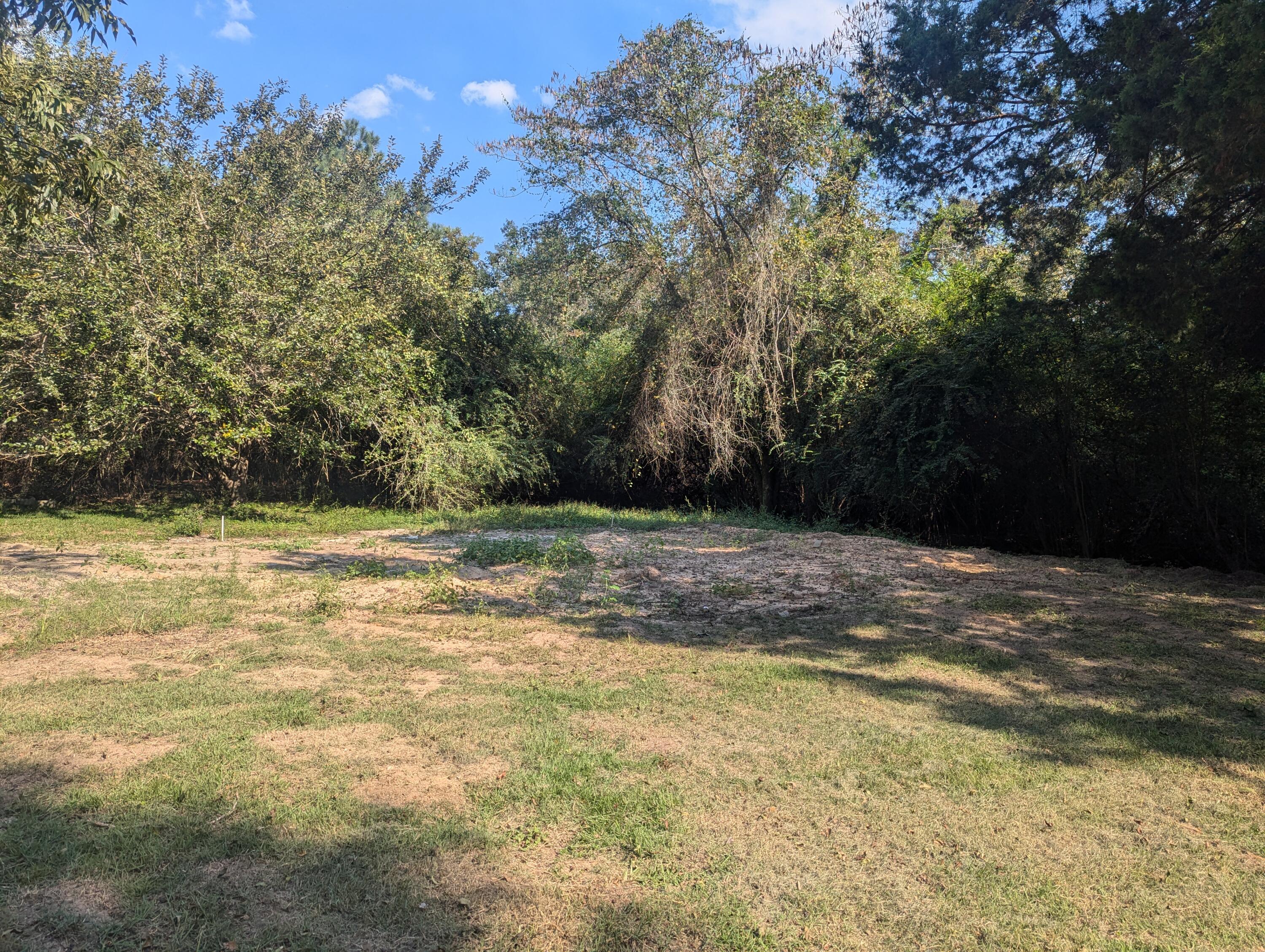 17 acres on paved road in Laurel Hill, North Okaloosa County. The electric and Laurel Hill Water are on. There are 2 septic tanks on the property, however Seller doesn't know the status or working condition....peace and quiet of country living on a paved road and only about 20 minutes to Crestview for shopping, restaurants and Interstate 10 or 20 minutes to Lake Jackson and Florala, AL.