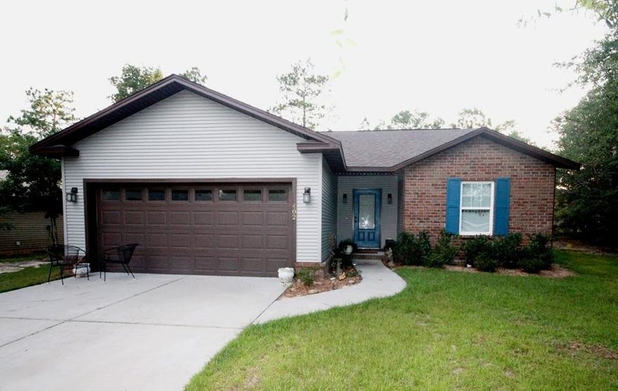 Seller is motivated and will pay the title fee! This amazing open floor plan is the beautiful home you've been looking for. Built in 2011, everything is in move in ready condition. Stainless Steel appliances, spacious bedrooms, and a covered back porch are just a few of this home's best features. Located in the desirable neighborhood of Hunter's Ridge. This carefully planned, private community is located directly behind the new Walton Senior High School off Walton Road. It features illuminated community sidewalks, private entrance, underground utilities, and an improved highway crossing to schools and the Wee Care Park. The location of Maude Saunders Elementary School is within 1 mile. Call today for more information.