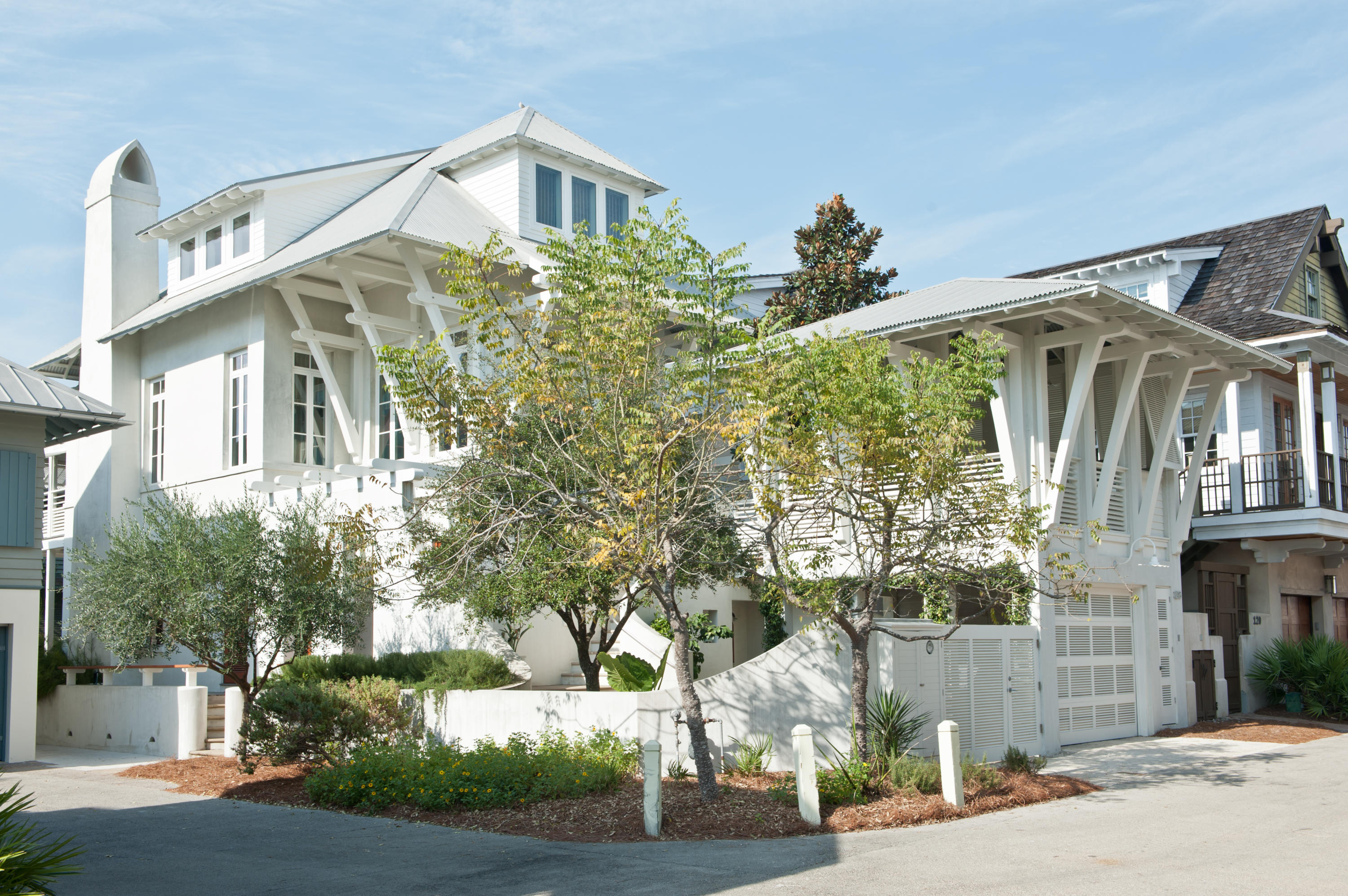 Luxury Contemporary Home in Rosemary Beach, Phase 10, South of Water Street, One House Off the Beach, with Killer Gulf Views. Featured in various architectural tours, this Julia Starr Sanford designed contemporary home is steps away from your beach chairs. This casual yet sophisticated home was meticulously designed for fun, comfortable living, and entertaining at the beach. With Rosemary's Main Street and Western Green just around the corner, you'll enjoy privacy with proximityin one of the best locations in Rosemary Beach. The second floor living, kitchen, and dining areas span an open full floor with an oversized porch and comfortable seating. The generous bedroom suite on the third floor has its own lounge and balcony with great views. There are two first floor bedroom suites,