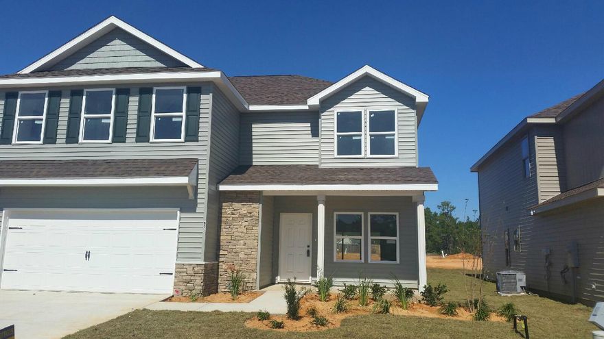 This four bedroom home features custom touches such as arches and display niches. Each bedroom features a walk-in closet and the master bedroom features two walk-in closets. There is a den/office on the first floor and a study hall on the second. The Cottages at Sandy Ridge is a quaint 34 home subdivision featuring low maintenance yards with custom privacy fences and irrigation systems. The homes are custom designed by Robert Fisher of Signature Builders ( a multiple award winning area builder for over 30 years. Some of the features include Low ''E'' insulated glass, Carrier High Efficiency 14 SEER air conditioning system,GRANITE countertops and STAINLESS STEEL APPLIANCES in the kitchen,Porcelain Tile in