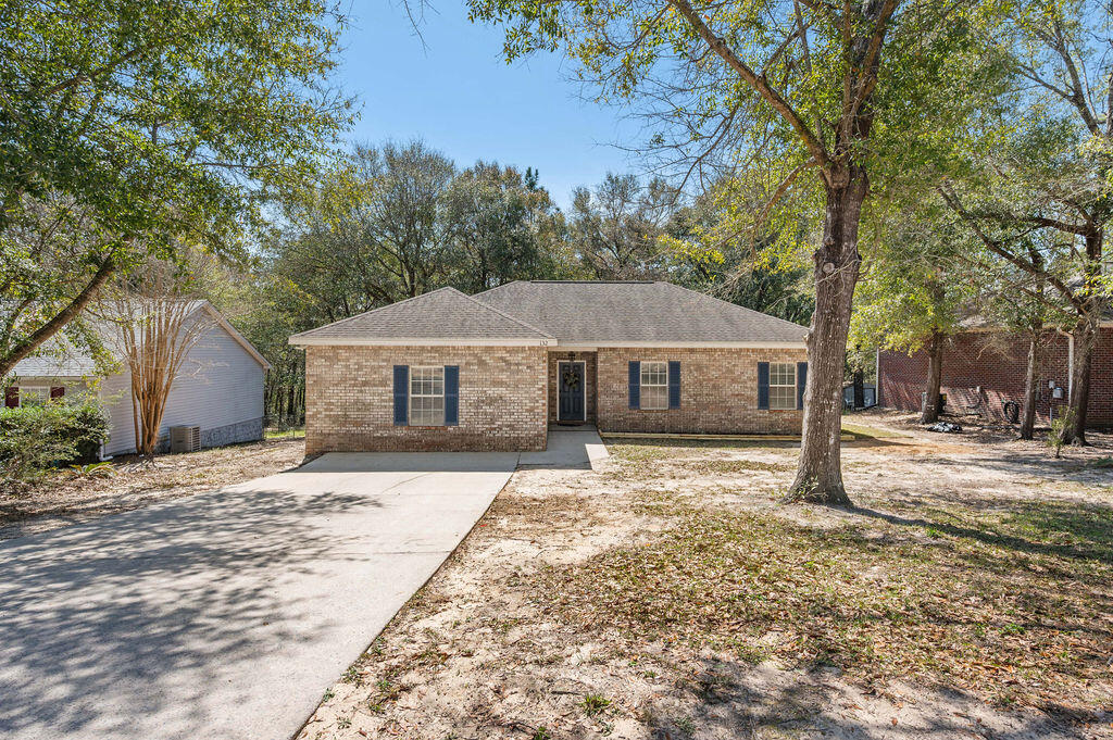 Back on the market, Buyer financing fell through. Spacious & Versatile Home on a Large Tree-Lined Lot! This charming home offers a flexible floor plan with three bedrooms plus a large additional space that can be used as a fourth bedroom, bonus living area, or game room--tailor it to fit your needs! Enjoy fresh updates, including new luxury vinyl plank flooring in much of the living area and new carpet in the bedrooms. The open-concept layout features split bedrooms, a primary suite with a garden tub, separate shower, dual vanities, and walk-in closet. Fall in love with the beautiful kitchen; it has plenty of cabinets and ample counter space featuring granite counter tops. Enjoy the privacy of your fenced backyard & a spacious deck perfect for entertaining. New roof with acceptable offer.