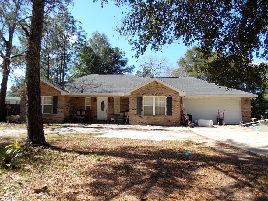 If you want to get out of the hustle and bustle and still be convenient to shopping and city, this is the perfect spot. This is a quality built, brick home on an over-sized lot with plenty of room to park an RV or boat. The extra large, privacy fenced back yard has a hot tub right out the back door. Inside, enjoy some privacy with the split floor plan, large walk-in closet in the master bedroom and private bath. The master bedroom features a double trayed ceiling. Located on 1/2 acre not far from town. No carpets here! All floors are tile and laminate wood! This home features the popular open floor plan. The living/dining area is very spacious and has a high vaulted ceiling. There is a large laundry room and over-sized garage. See more....