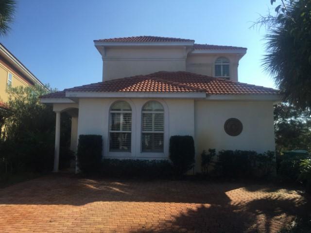 Beautiful Mediterranean style home in Calusa Bay offers much potential. You are welcomed by glass french doors into the large tiled living area. A screened Lanai is offered off the living room providing a space to relax & enjoy water views. The kitchen is open to the living area & is equipped with granite counter tops. The spacious master suite is situated on the first floor featuring a large walk in closet & the master bath has an over sized garden tub & separate shower. The remaining 2 bedrooms are on the 2nd floor & share a bath as well as a balcony to enjoy water views. Situated in the gated community of Calusa Bay, you'll enjoy amenities pool area with baths & shower as well as access to Regatta Bay.