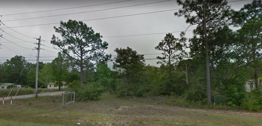 Commercial Lot with good visibility & exposure along East Bay Blvd. This lot is zoned Highway Commercial Development. This allows for many different commercial uses. The property is on the SW corner of East Bay Blvd. & Andorra Street. The property is priced to sell.