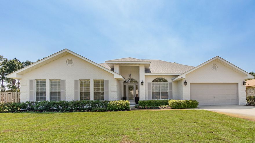 This sprawling, open floor plan, single story brick home is a must see. 4 bedrooms, 3 baths almost 3000 sq ft of living space, sitting on over a half acre lot, backs up to a lake & park. New roof, water heater, appliances, washer/dryer, vinyl plank flooring through out,  tubs, toilets, countertops, backsplash, lighting, custom closets. Inside you will find a large kitchen with 2 islands, giving  additional counter & seating, ample cabinets, walk-in pantry. Large living with high ceilings. Fenced back yard, big patio, two-car garage plus ample driveway. Close proximity to Choctawhatchee Bay, Publix, Sacred Heart Hospital, shops at Grand Blvd..