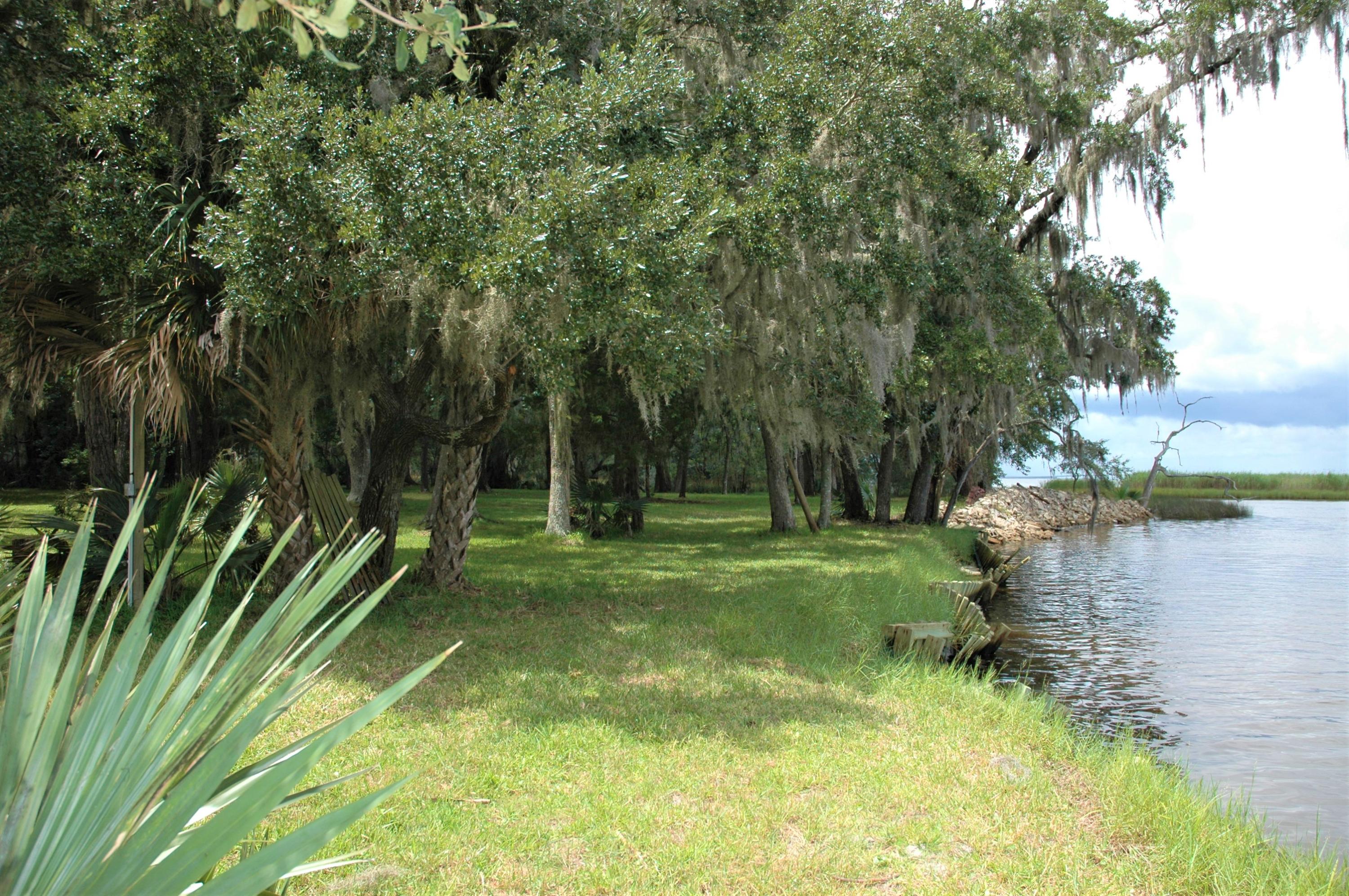 4. 5 Plus acres! WATERFRONT! The Shallows is an established community with mature oak trees, plenty of privacy and awesome water views. This property has 2 homes on it, one home is 2234 square feet heated and cooled and the other is 3280 square feet H&C and is adjacent to Tucker Bayou and the Choctawhatchee Bay. The canal is about 4 - 6 ft deep on a portion of the property, the property has plenty of room for a dock on the canal and bay. This property is great for a family compound or divide it up into 3 parcels for 3 homes (currently with 2 existing homes). This property is ideal for the fisherman! One of the few old Florida looking land parcels with large Oak trees, large Ponderosa Pines with a beautiful Florida landscape. This is a must see!! Property sold AS IS.