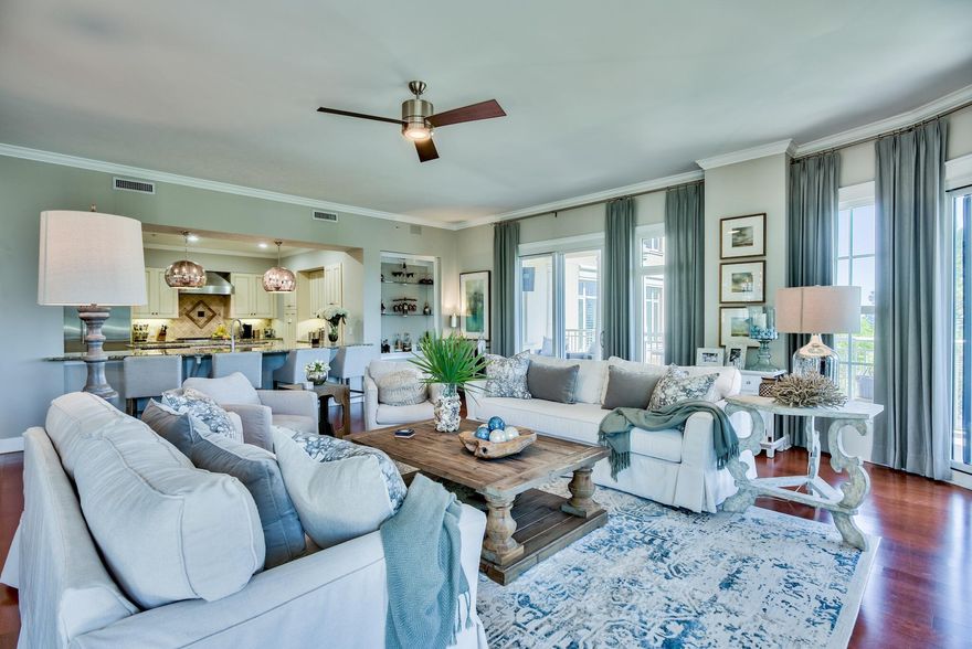 This ground-level entry ''Castleton'' Floorplan is offered furnished! Unit 303 overlooks the Choctohatchee Bay and the famous Fred Couples design championship golf course. The One Water Place complex houses two large pools, hot tub, indoor and outdoor spas, a full sized gym, movie theatre, game room, dog park, and common areas for parties and get togethers. Unique to this unit is an enlarged master closet. This unit also boasts 10 ft ceilings, crown molding, hard wood floors in the living areas, gas fireplace, a spacious kitchen with granite countertops and Viking professional appliances, and a wrap around balcony overlooking the bay. You also get 2 separate air conditioned storage rooms ES11 & S31. Unit is also assigned two garage parking spaces E126/E125, along with a golf cart space 1