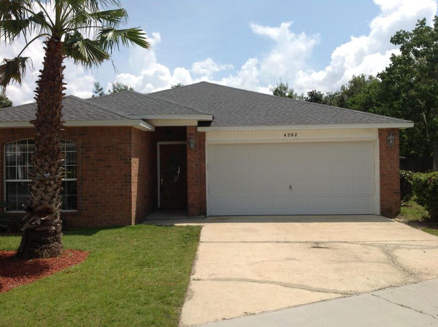 In Real Estate is all about location, this traditional all brick home is situated on a large corner lot, fenced backyard, across the street from waterfront homes overlooking BWB marina with NO H.O.A. DUES! It has a desirable spilt bedroom plan, with the master bath having his and her walk-in closets, along with double vanities sinks. Freshly painted neutral colored walls through out, with all NEW stainless steel Kenmore appliances installed on 7/14/14. Adding more ''Give-ME's'', the Seller had new w/w carpet in a neutral beige installed along with a new roof on 8/6/14, which completes this newly up-dated home! Now all it's missing is YOU!