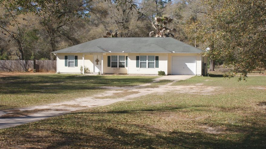 ***Price Reduced*** This beautiful home located between Holt and Baker off of Lighthouse Church Rd is a perfect location for you! Lighthouse Church Rd has recently been repaved making for a great road frontage. With close to 2 acres of land you will have plenty of yard space for family gatherings and those long summer evenings of outdoor activities with the family. Three bedroom, two bath home with a split floor plan. The living area flows well into the dining and kitchen area, and boast vaulted ceilings. The owners just had a brand new septic system installed with a brand new drain field. This is a must see property and could be your next home! Call today for your showing.