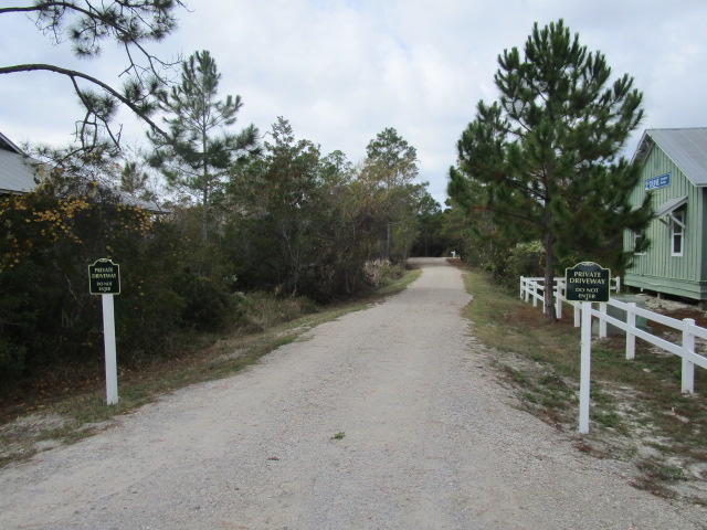 Vacant lot 39 McKinnie's Unrecorded subdivision- totaling 1/3 acre. Zoned Village Mixed-Use creating multiple possibilities. Located at end of private, dead-end road. NO HOA! Adjavent cottage on lot 38 also for sale MLS 859272. Walk to famous Black Bear Bakery, Wine Bar, Hurricane Oyster Bar and Grayton Corner Cafe, AJ's, Borago, Grayton Brew Pub and more! County GIS maps indicate potential jurisdictional wetlands onsite-buyer to do own due diligence.