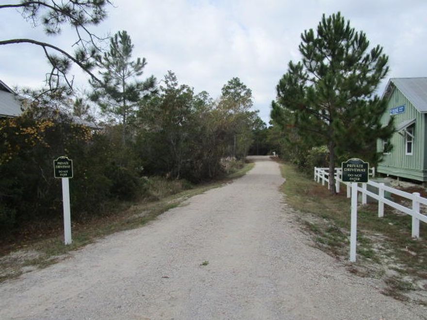 Vacant lot  39 McKinnie's Unrecorded subdivision- totaling 1/3 acre. Zoned Village Mixed-Use creating multiple possibilities. Located at end of private, dead-end road. NO HOA! Adjavent cottage on lot 38 also for sale MLS 859272.  Walk to famous Black Bear Bakery, Wine Bar, Hurricane Oyster Bar and Grayton Corner Cafe, AJ's, Borago, Grayton Brew Pub and more!  County GIS maps indicate potential jurisdictional wetlands onsite-buyer to do own due diligence.