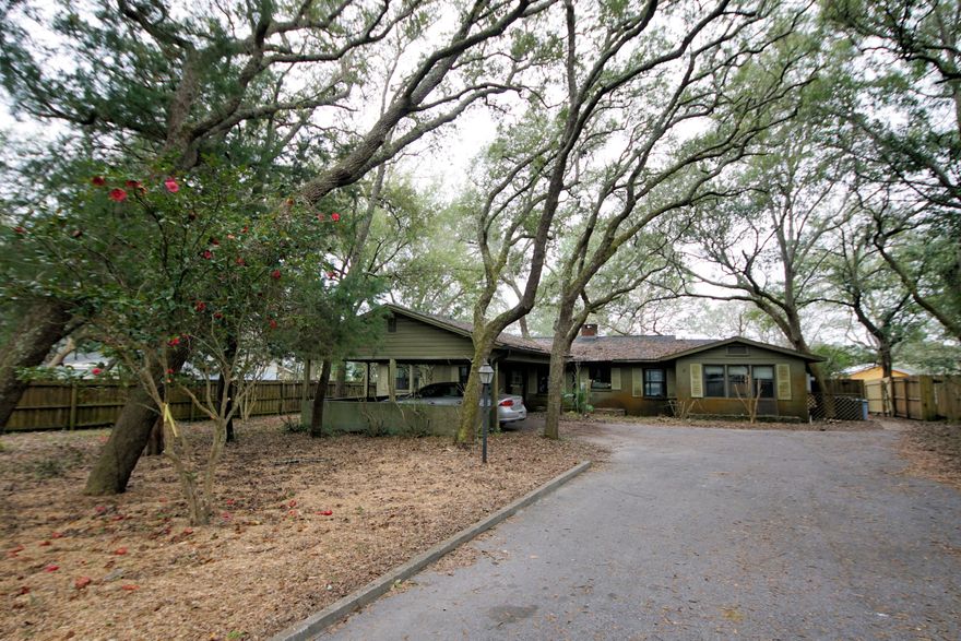 Gorgeous Waterfront Lot in the Middle of Fort Walton Beach! Older Home Ready for Your Redesign. Pictures coming soon. Buyer to verify all measurements.