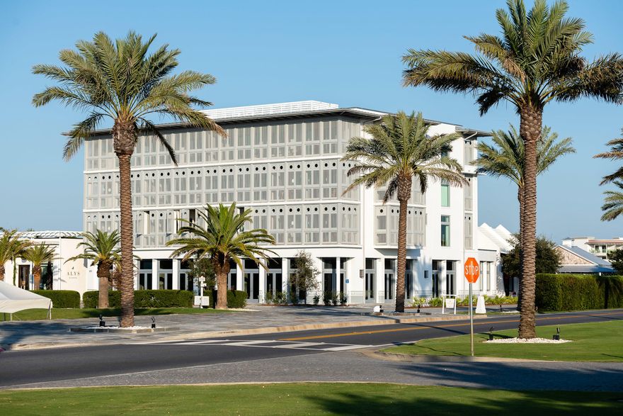 Highly desired top floor 3 bedroom plus bunk Alys Beach Town Center condo. Expansive Bi-folding doors open the kitchen, dining and living areas to a large covered porch with views west over the amphitheater and towards the newly completed Beach Club.