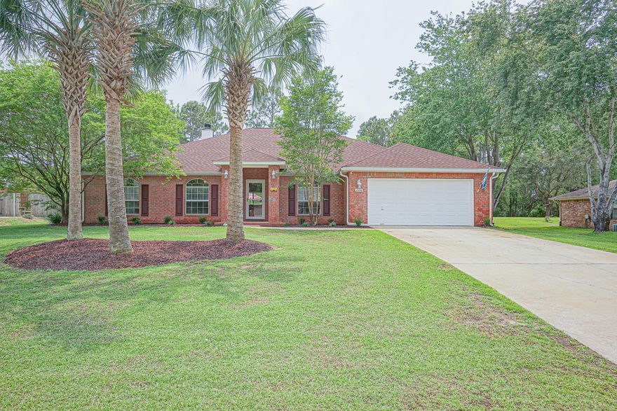 All brick Holley By The Sea spacious 4 bedroom 3 bathroom beauty! This masterly thought out floor plan has been spruced up for its next family. Warm yellow front door greets you into a tiled entry way with playroom/dining room to your right and office/living room to your left. Large great room with 10 foot ceilings featuring new built ins flanking the fireplace. Split floor plan has 3 generous sized bedroom with 2 full baths, including one leading to the level, fully fenced backyard. Large master suite has 2 walk in closets with dual sinks, garden tub and separate shower. The kitchen is the heart of the home with extra large eating area, new door knobs, updated back splash and great island. Most of the popcorn ceilings have been removed, new cordless blinds, tastefully painted rooms.... are just some of the many updates. The roof is 2018 and under warranty for 20 years, hot water heater 2019, HVAC 2014 as well as the spacious, level backyard features a new concrete patio, patio lights, new ceiling fan and completely privacy fenced in with shed. Holley by the Sea recreation center has pools, tennis courts, Bay access that is unmatched. Need an updated, spacious, warm all  brick Holley by the Sea home- this is it!