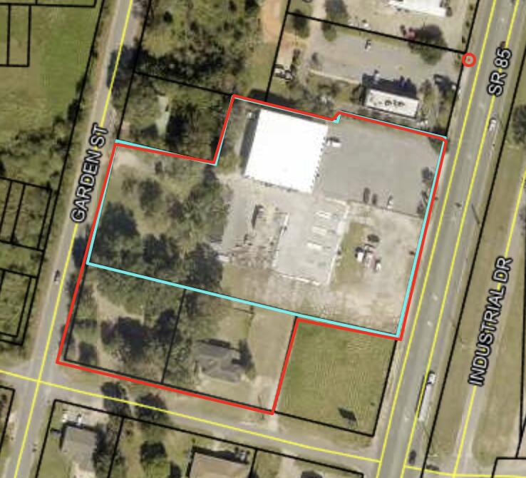 3.83 acre parcel on N Ferdon Blvd in Crestview, located across the street from new proposed Walmart, property has access to N Ferdon Blvd, and Third Street and Garden Street, currently has a 10,000 SF building with short term lease with Southern Supply and a month to month residential home, great development site in a fast growing area, high traffic count just south of Crestview High School
