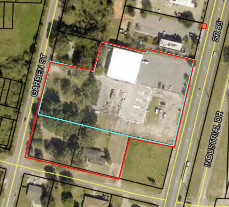 3.83 acre parcel on N Ferdon Blvd in Crestview, located across the street from new proposed Walmart, property has access to N Ferdon Blvd, and Third Street and Garden Street, currently has a 10,000 SF building with short term lease with Southern Supply and a month to month residential home, great development site in a fast growing area, high traffic count just south of Crestview High School