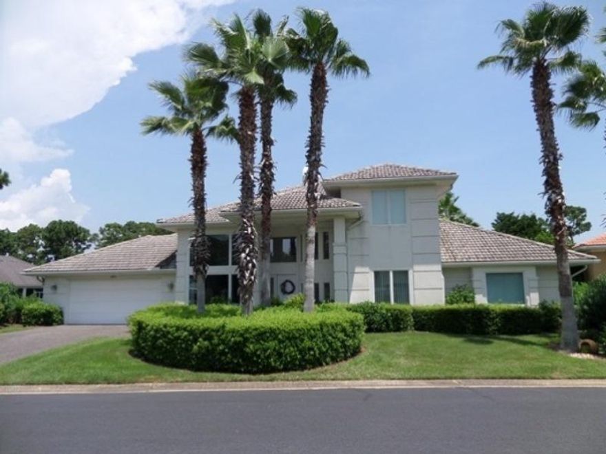 This large Contemporary home built byGary Miller, is located in theprestigious gated community of Sunset Beach. Offers a bright open concept with vaulted ceilings in both the living and family rooms. The home has a large covered patio for entertaining, which overlooks the lake with a fountain on the 5th hole of the Marsh golf course in Bluewater Bay. This homefeatures a large eat in kitchen with a center island, a formal dining room with a tray ceiling. It has a spacious master bedroom and bath on the 1st floor, plus an additional bedroom/den and half bath on the lst level. The 2ndlevel features 2 additional bedrooms with separate baths for each, along with a balcony that overlooks the lake and golf course. This home is on a large corner lot that offers wonderful views. Home Warr