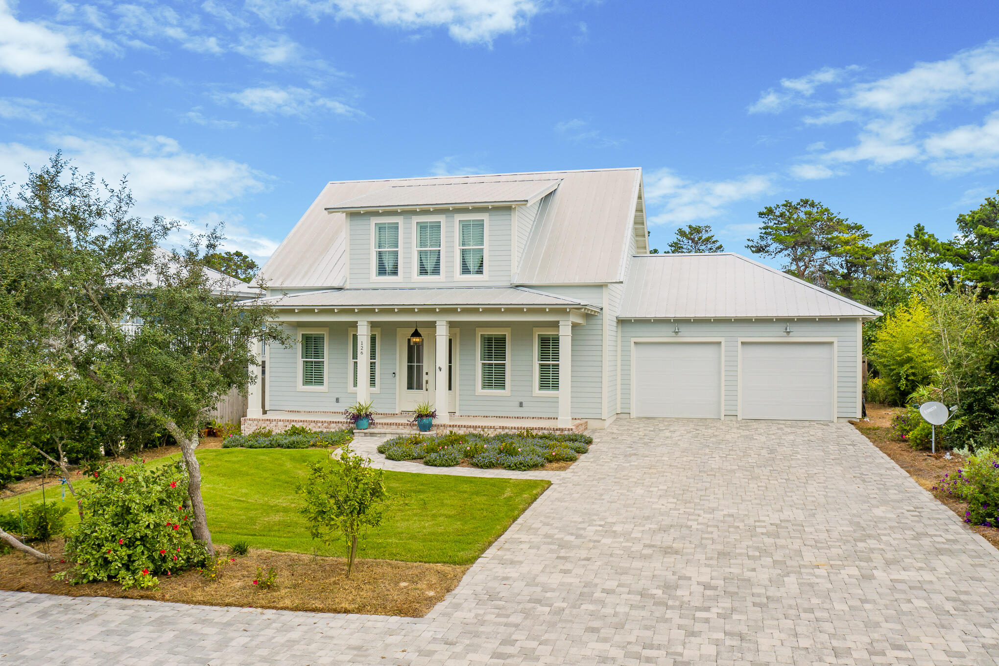 Never Rented!! No HOA!! Home with heated pool and spa in Dune Allen, less than 1/2 mile from the Dune Allen regional beach access, Stallworth beach access and Stinky's Fish Camp and Bait Shack. The home features a 2 car garage and an oversized driveway with parking for 7 additional cars. Main floor features an owners suite with large walk in closet as well as an additional bedroom with an en suite bath. The chef's kitchen has SS appliances and plenty of workspace for entertaining. Large mudroom features the laundry area and an additional walk in pantry. The sliding glass door in the living room leads to large covered patio overlooking the pool, 12-14 person spa, and privacy fenced backyard. Upstairs boasts 2 large bedrooms with 2 walk in closets each, a full bath, and a loft/office area.
