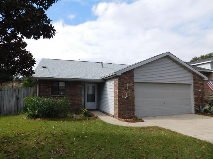New Ash wood floors in entry and living / dining rooms! New double door refrigerator, ceramic tile in both bathrooms, new toilets, double insulated window coverings, screened in porch, master suite, new paint throughout, all rooms have ceiling fans, built in microwave, lovely yards, room for a basketball hoop, sidewalks throughout the neighborhood, Anderson storm/screen doors, and great neighbors.New roof in 2017, hurracaine rated garage door. Sidewalks throughout the neighborhood. Double insulated window blinds, ceramic tile in both bathrooms, and new toilets in 2017. Water purification System: Reverse Osmosis. Back yard decorative lighting.